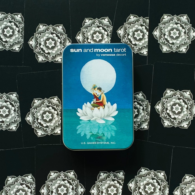 Sun And Moon Tarot cards in a tin US Games Systems